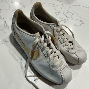 Nike Women's White and Gold Sneakers